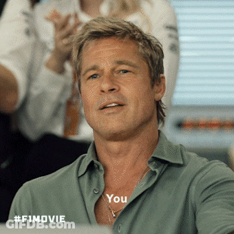 A Man In A Green Shirt With The Word You On His Neck GIF