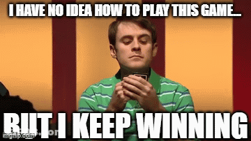A Man In A Green Striped Shirt Is Holding A Card And Says I Have No Idea How To Play This Game . GIF