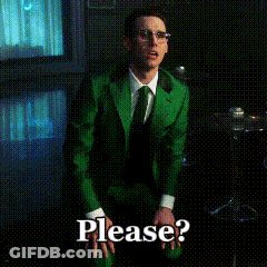 A Man In A Green Suit And Tie Is Kneeling Down And Saying Please ? GIF