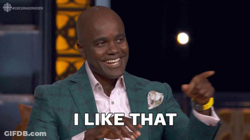 A Man In A Green Suit Says " I Like That " While Pointing GIF