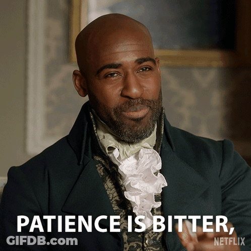 A Man In A Green Suit Says Patience Is Bitter On Netflix GIF