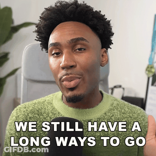 A Man In A Green Sweater Is Saying We Still Have A Long Way To Go GIF