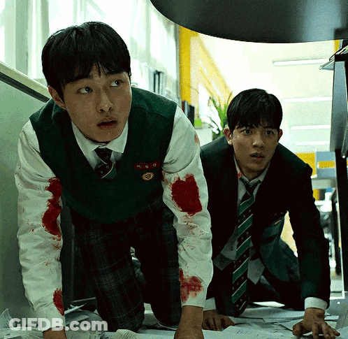 A Man In A Green Vest Has A Badge That Says ' A ' On It GIF
