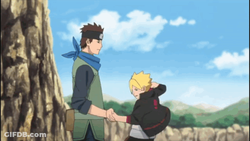 A Man In A Green Vest Is Shaking Hands With A Boy In A Black Hoodie GIF