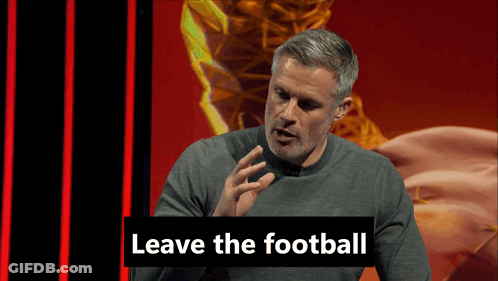 A Man In A Grey Sweater Is Speaking Into A Microphone With The Words " Leave The Football " Behind Him GIF
