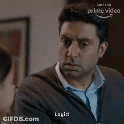 A Man In A Grey Sweater Says Logic In Front Of An Amazon Prime Video Advertisement GIF