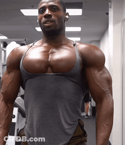 Man In Grey Tank Top With Large Chest GIF