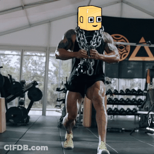 A Man In A Gym With A Box On His Face GIF