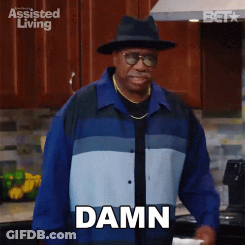 A Man In A Hat And Sunglasses Says Damn GIF