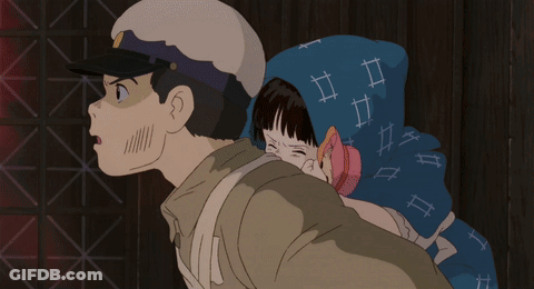 A Man In A Hat Is Carrying A Girl In A Blue Scarf On His Back GIF