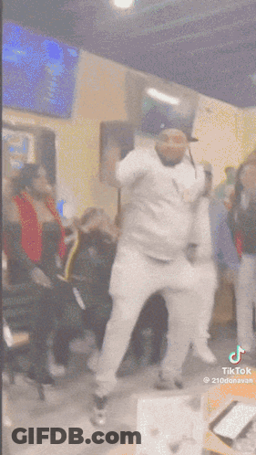 Man In Hat Dancing In Front Of Crowd GIF