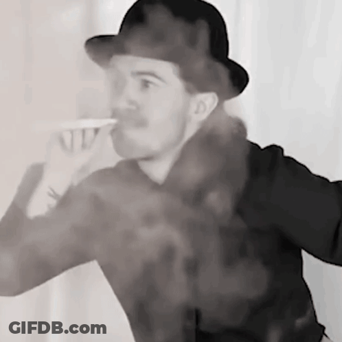 A Man In A Hat Is Drinking From A Cup With Smoke Coming Out Of His Mouth . GIF