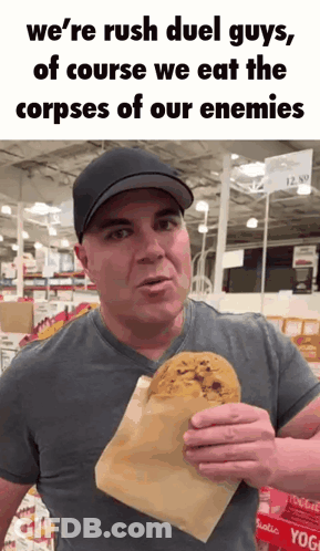 A Man In A Hat Is Holding A Cookie In A Paper Bag And Says We 'Re Rush Duel Guys GIF