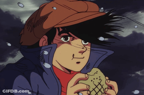 Man In Hat Holding Bread GIF