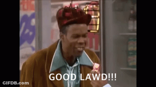 A Man In A Hat Is Holding A Piece Of Candy And Saying `` Good Lawd ! '' GIF