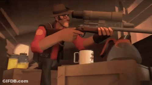A Man In A Hat Is Pointing At A Sniper Rifle .. GIF