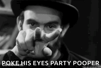 A Man In A Hat Is Pointing At The Camera And Saying `` Poke His Eyes Party Pooper '' . GIF