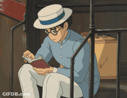 A Man In A Hat Is Reading A Book While Sitting On A Railing GIF
