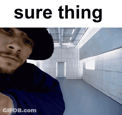A Man In A Hat Is Standing In A Hallway With The Words Sure Thing Above Him GIF