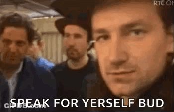A Man In A Hat Is Standing In Front Of A Group Of Men And Says `` Speak For Yerself Bud '' . GIF