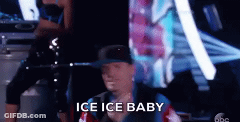 A Man In A Hat Is Standing In Front Of A Group Of People And Says Ice Ice Baby . GIF