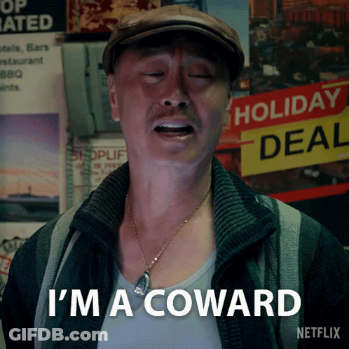 A Man In A Hat Says I 'M A Coward GIF