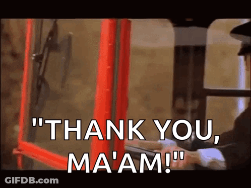 A Man In A Hat Says " Thank You Ma 'Am " In Front Of A Red Phone Booth GIF