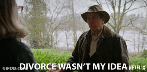 A Man In A Hat Talks To A Woman With The Words Divorce Wasn 'T My Idea GIF