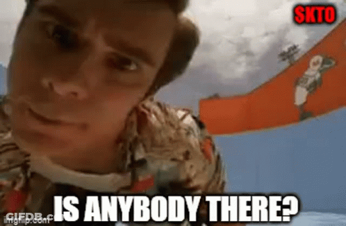 A Man In A Hawaiian Shirt Is Asking Is Anybody There . GIF
