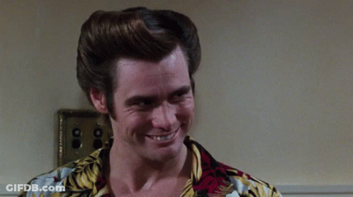 A Man In A Hawaiian Shirt Is Making A Sad Face GIF