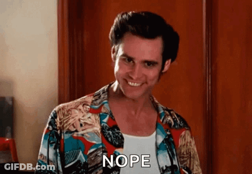 A Man In A Hawaiian Shirt Is Smiling And Saying Nope GIF