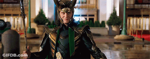 A Man In A Helmet And Armor Is Holding A Spear And Giving A Thumbs Up GIF