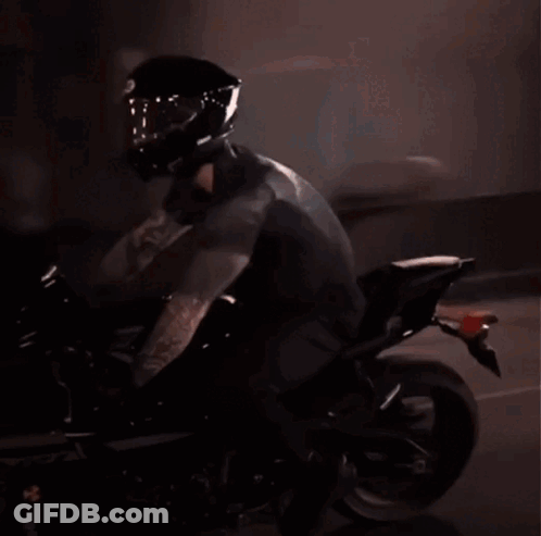 Man In Helmet Riding Motorcycle GIF