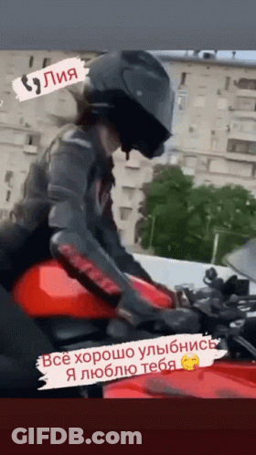 Man In Helmet Sitting On Red Motorcycle GIF