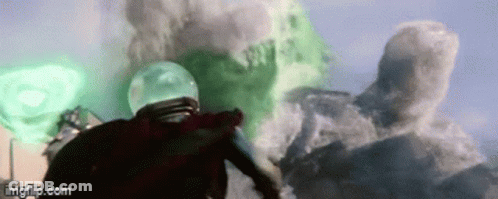 A Man In A Helmet Is Standing In Front Of A Green Explosion In A Movie . GIF