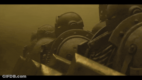 A Man In A Helmet Stands In The Water GIF