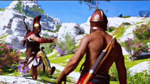 A Man In A Helmet Stands Next To Another Man GIF