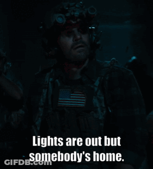 A Man In A Helmet With The Words Lights Are Out But Somebody 'S Home GIF
