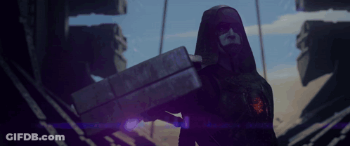 A Man In A Hood Is Carrying A Purple Box GIF