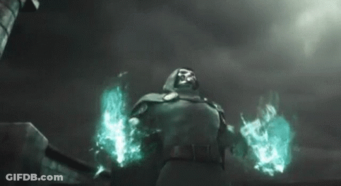 A Man In A Hood Is Standing In Front Of A Building And Holding A Torch . GIF