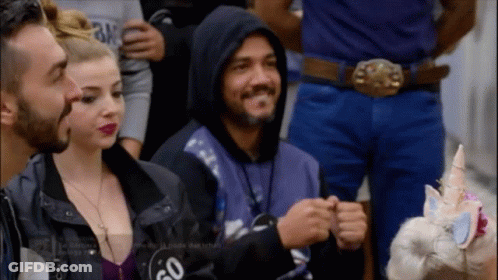 A Man In A Hooded Jacket Has The Number 50 On His Back GIF