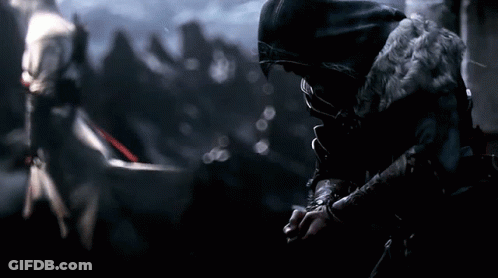 Hooded Men Standing Next To Each Other GIF