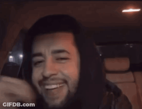 A Man In A Hooded Jacket With The Words Block Haha On The Bottom GIF
