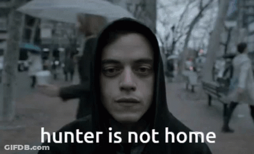 A Man In A Hooded Jacket With The Words " Hunter Is Not Home " On The Bottom GIF