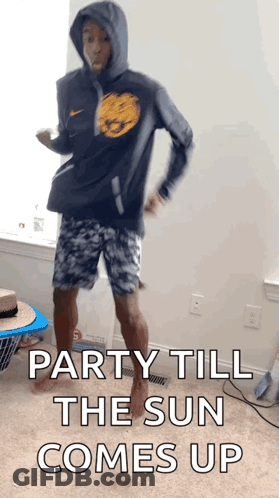A Man In A Hoodie Is Dancing In A Room With The Words Party Till The Sun Comes Up On The Bottom GIF