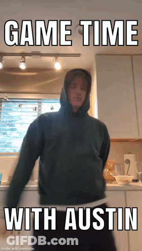 Hoodie Man Standing In Kitchen With Game Time Austin GIF