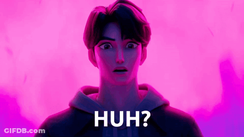 A Man In A Hoodie Is Standing In Front Of A Pink Background With The Words Huh Written In White Letters GIF