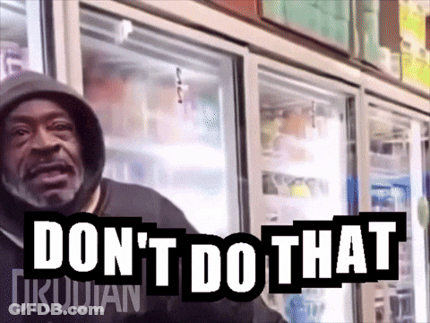 A Man In A Hoodie Stands In Front Of A Refrigerator With The Words " Don 'T Do That " On It GIF