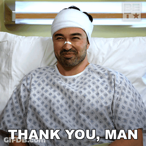 A Man In A Hospital Gown With A Bandage On His Head And The Words Thank You Man Below Him GIF