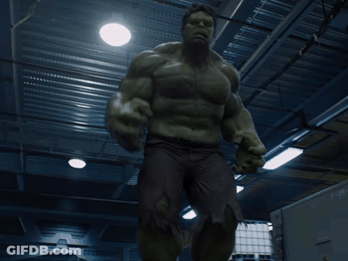 Man In Hulk Costume Standing In Room GIF